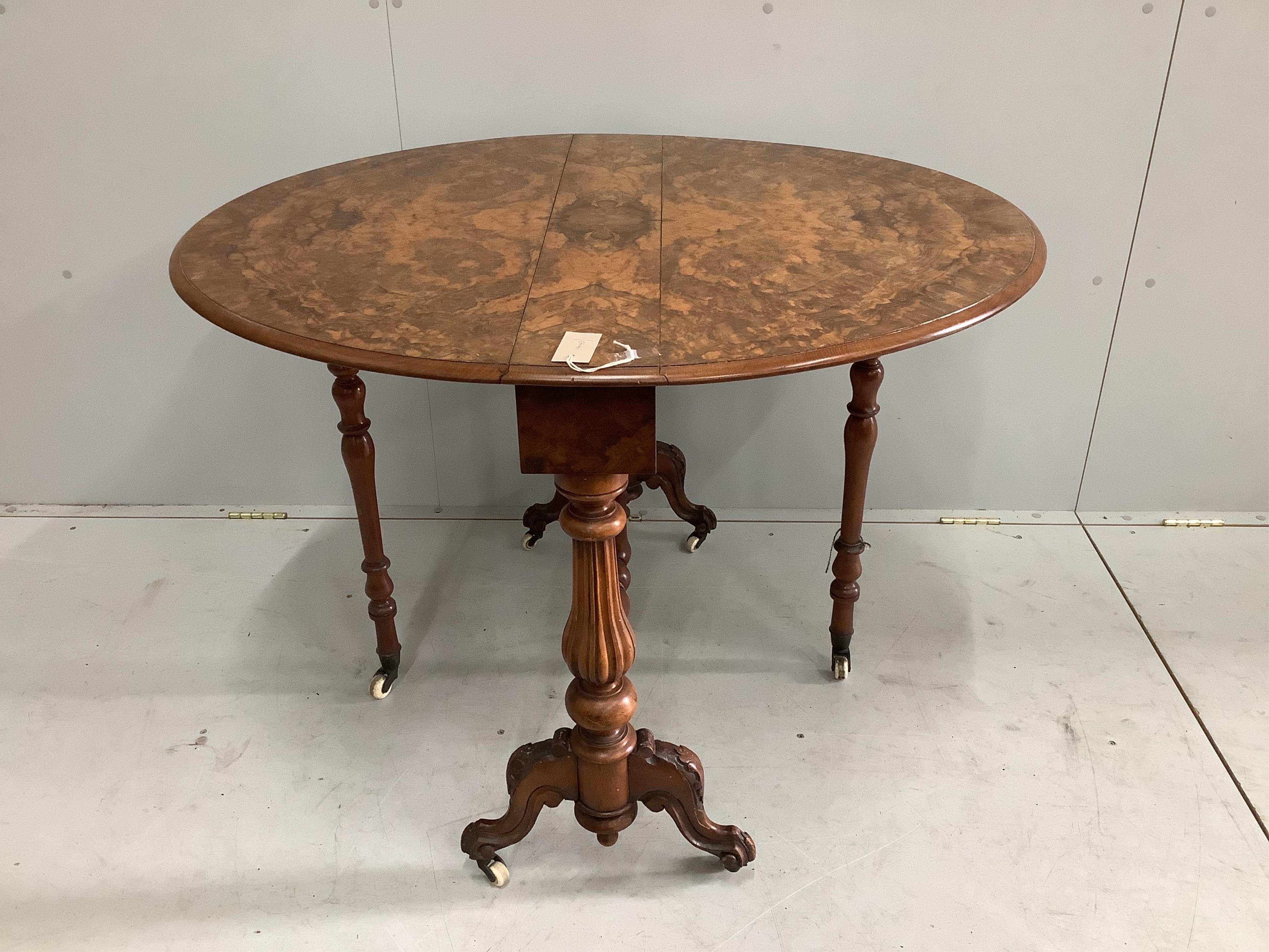 A Victorian figured walnut Sutherland table, width 88cm, depth 18cm, height 73cm